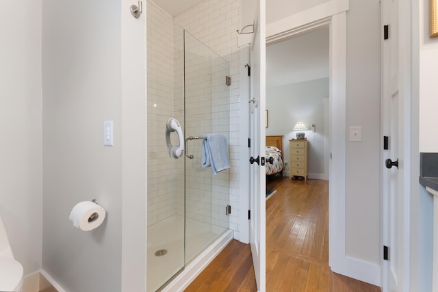 11 Beacon Dr, Brunswick, ME 04011 - bathroom with wood-type flooring and an enclosed shower