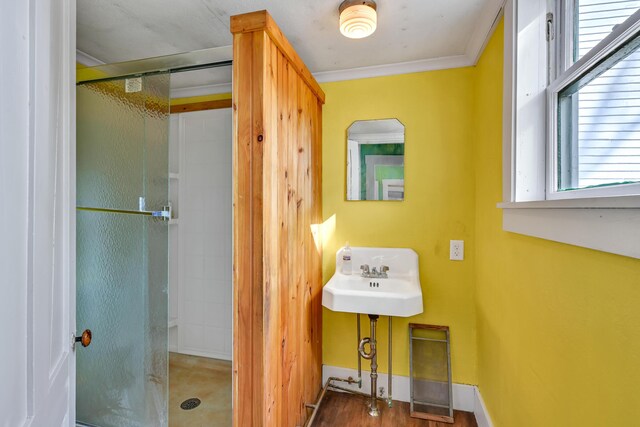 236 High St, Farmington, ME 04938 - full bath featuring a shower stall, a sink, crown molding, and baseboards