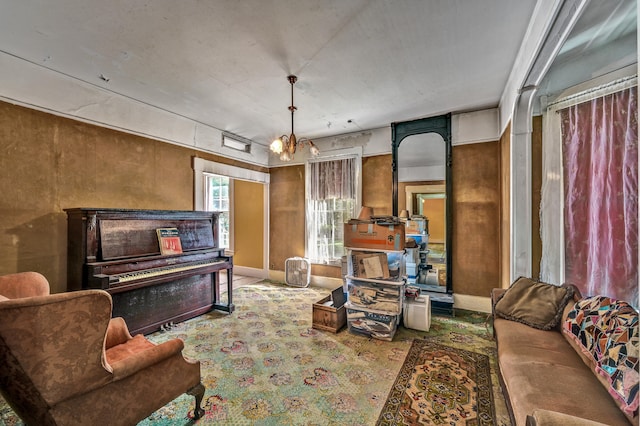 living room featuring an inviting chandelier