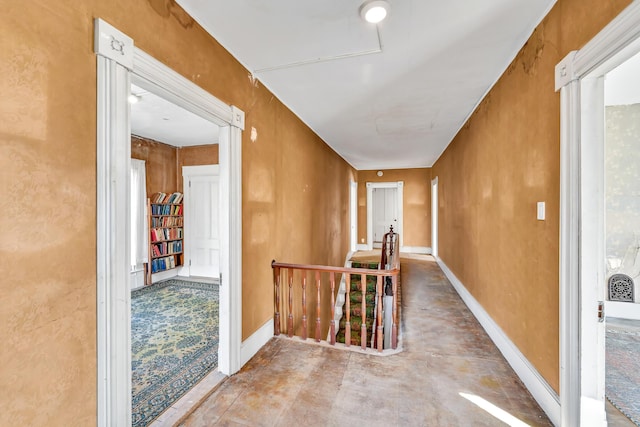 236 High St, Farmington, ME 04938 - hall with an upstairs landing, baseboards, and concrete floors