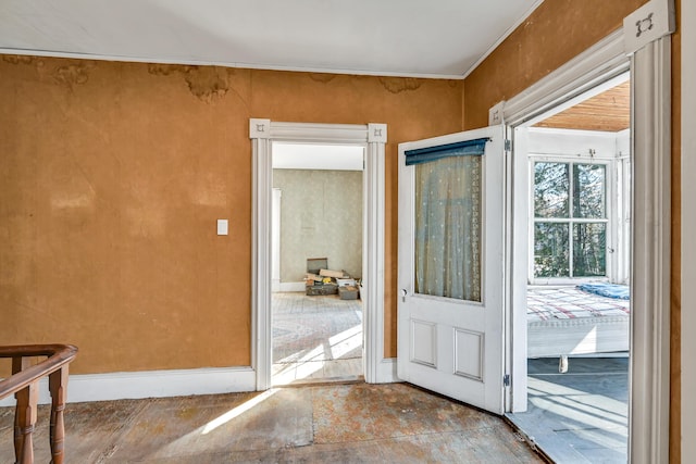 236 High St, Farmington, ME 04938 - foyer featuring baseboards and ornamental molding