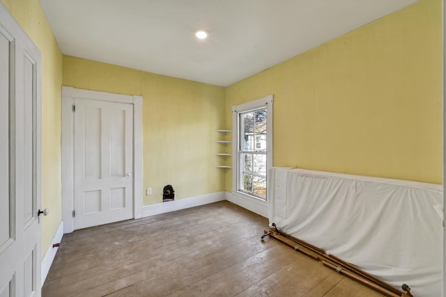 236 High St, Farmington, ME 04938 - spare room featuring hardwood / wood-style floors and baseboards