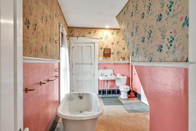 236 High St, Farmington, ME 04938 - full bath with wallpapered walls, a soaking tub, and toilet