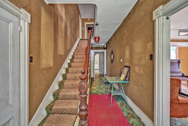236 High St, Farmington, ME 04938 - stairway with baseboards and carpet