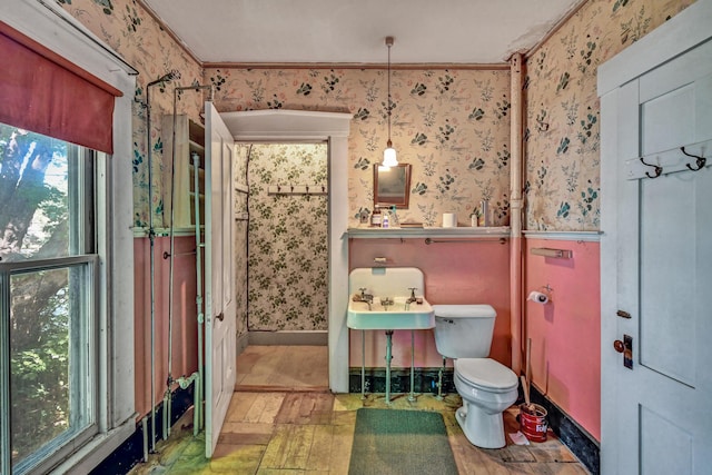 236 High St, Farmington, ME 04938 - full bathroom featuring wallpapered walls, toilet, vanity, wood finished floors, and crown molding