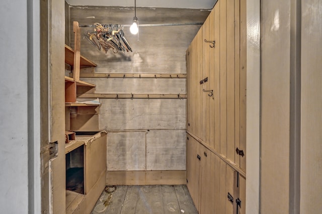 bathroom with hardwood / wood-style floors