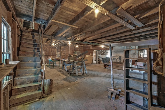 basement with hardwood / wood-style floors and wood ceiling