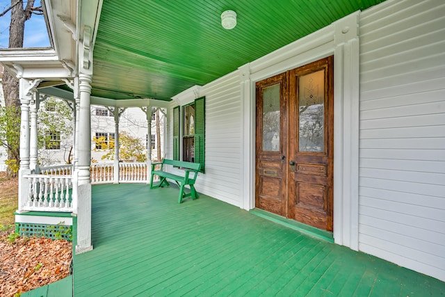 wooden terrace featuring a porch