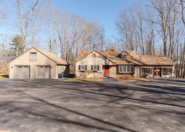 ranch-style home featuring a garage