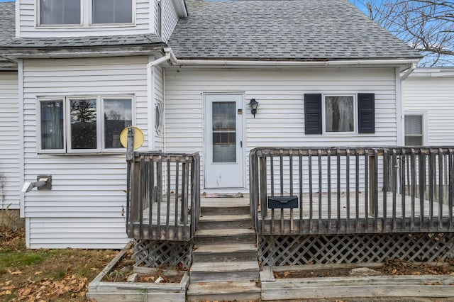 doorway to property with a deck