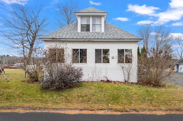 view of home's exterior featuring a lawn