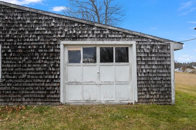 garage with a yard