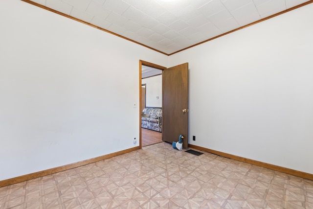 unfurnished room featuring light parquet flooring and crown molding