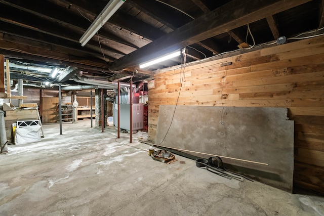 basement featuring heating unit