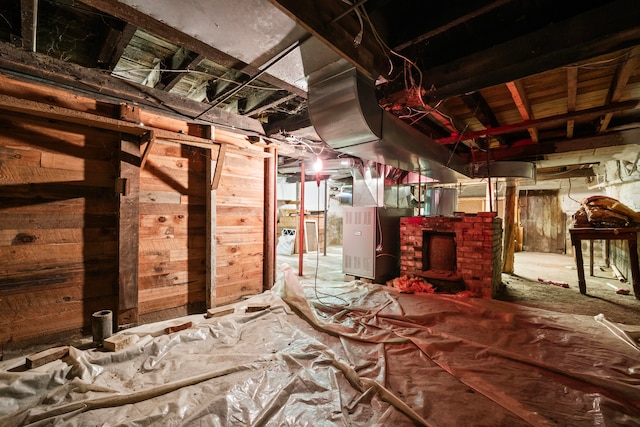 basement featuring heating unit