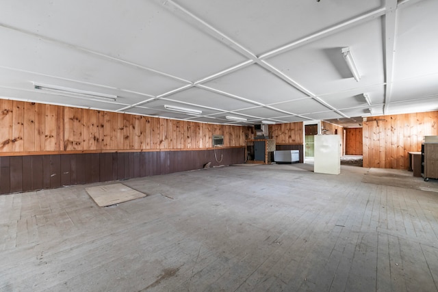 interior space featuring wood walls