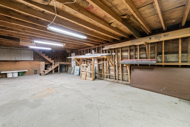 misc room with concrete flooring