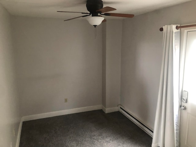 carpeted empty room featuring baseboard heating and ceiling fan