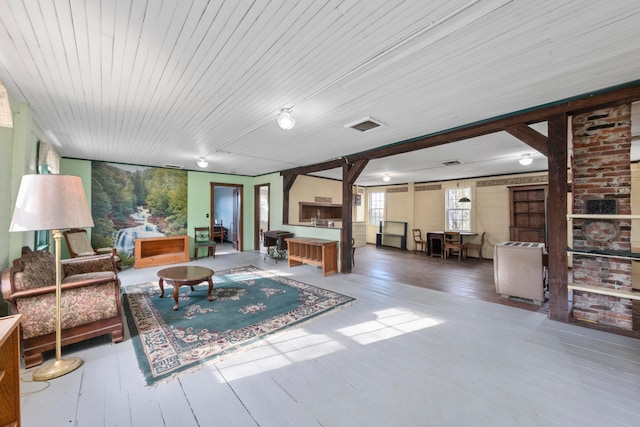 living room featuring wood ceiling and wood-type flooring