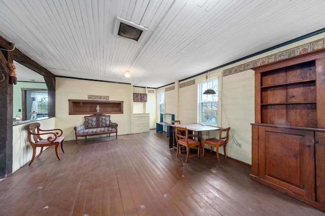 dining room with dark hardwood / wood-style flooring