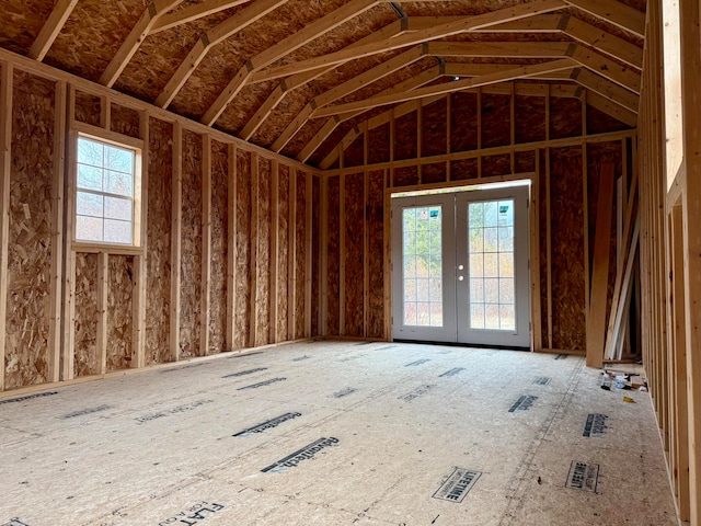 misc room with french doors and vaulted ceiling