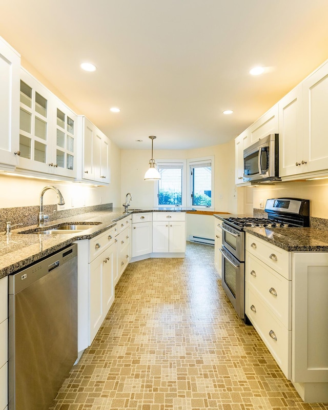 9 Jameson Point Rd Unit 10, Rockland, ME 04841 - kitchen featuring stainless steel appliances, brick patterned flooring, white cabinets, and recessed lighting