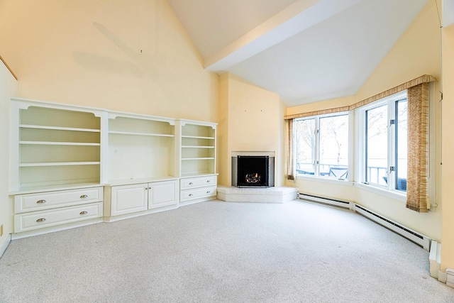 9 Jameson Point Rd Unit 10, Rockland, ME 04841 - unfurnished living room featuring carpet floors, a baseboard radiator, lofted ceiling, and a warm lit fireplace