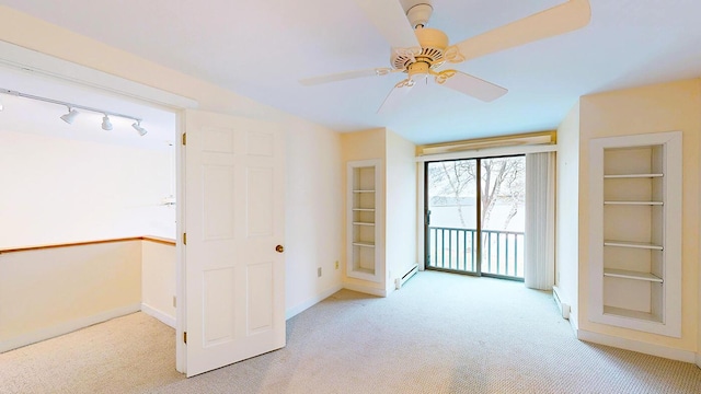 9 Jameson Point Rd Unit 10, Rockland, ME 04841 - unfurnished room featuring carpet flooring, a ceiling fan, and baseboard heating