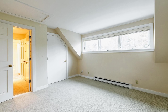 9 Jameson Point Rd Unit 10, Rockland, ME 04841 - additional living space with a baseboard heating unit, attic access, and carpet flooring