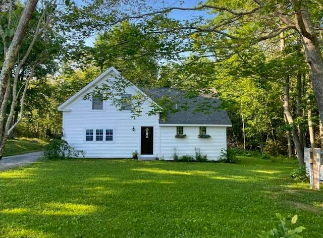 view of front of home with a front yard