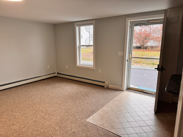 doorway to outside with baseboard heating and light colored carpet