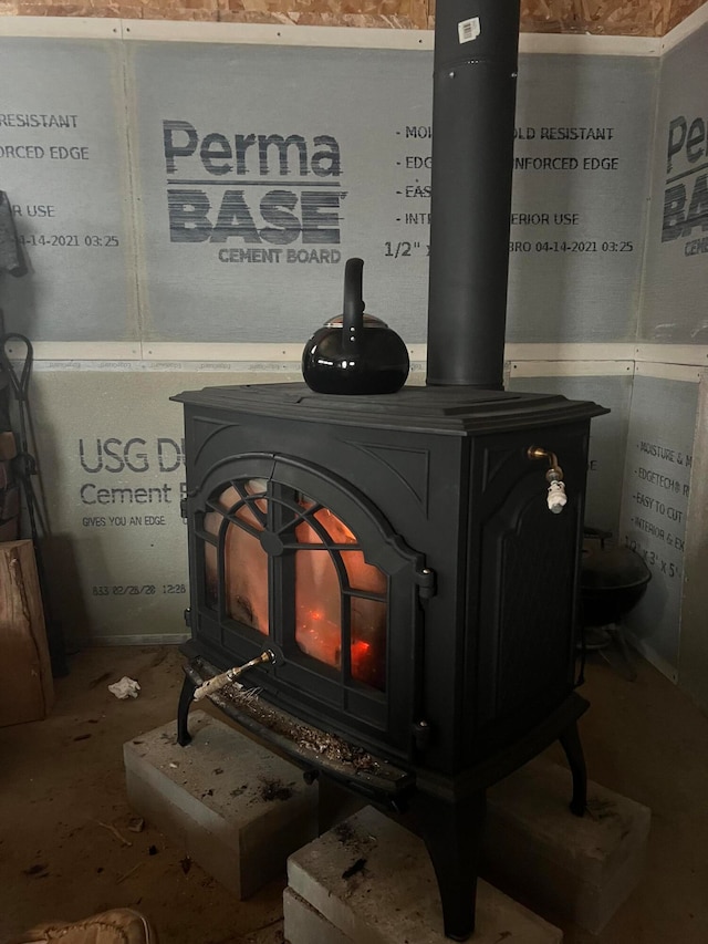 interior details featuring a wood stove