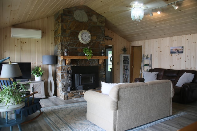 living room with wood walls, lofted ceiling, an AC wall unit, hardwood / wood-style flooring, and wood ceiling