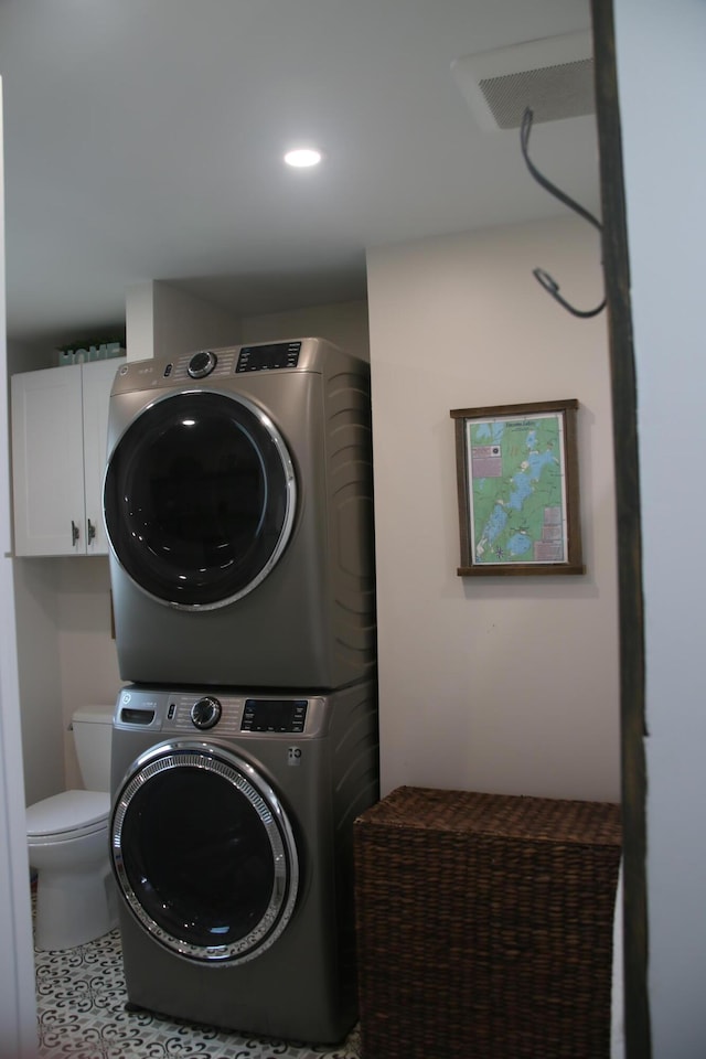 47 Fickett Dr, Litchfield, ME 04350 - laundry area with estacked washer and dryer and recessed lighting