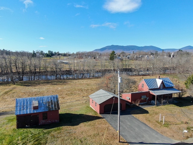 bird's eye view featuring a mountain view and a rural view