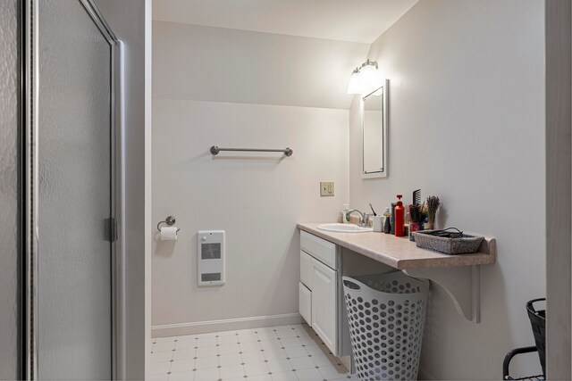 bathroom featuring vanity and heating unit