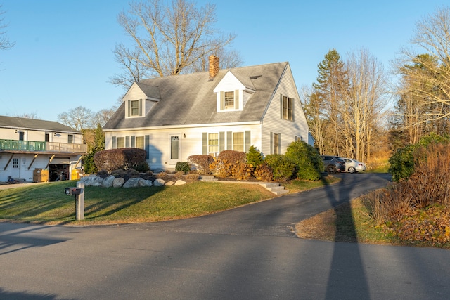 view of front of house with a front lawn