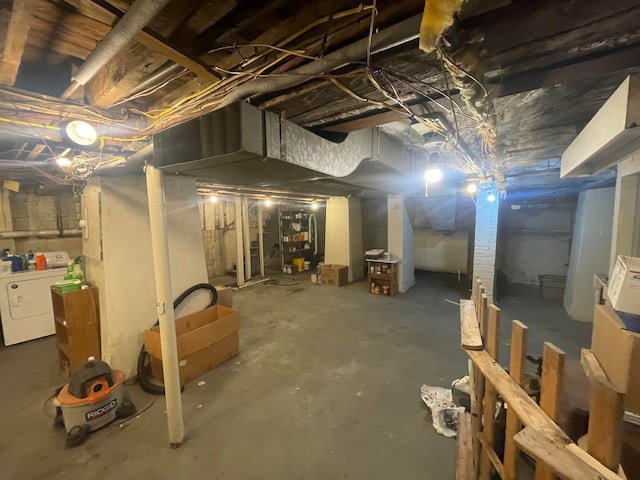 basement with washing machine and dryer