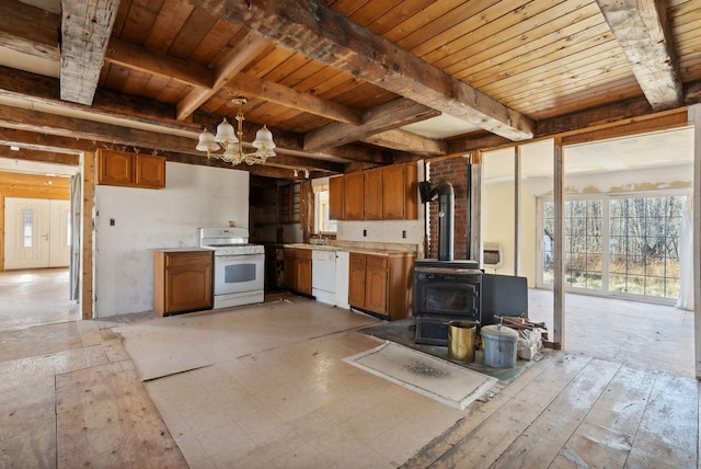 454 N Parish Rd, Turner, ME 04282 - kitchen featuring a wood stove, wooden ceiling, white appliances, and a notable chandelier
