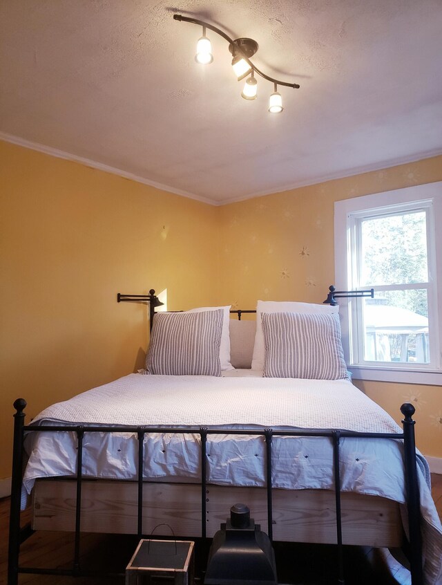 599 Plains Rd, Hollis, ME 04042 - bedroom featuring crown molding