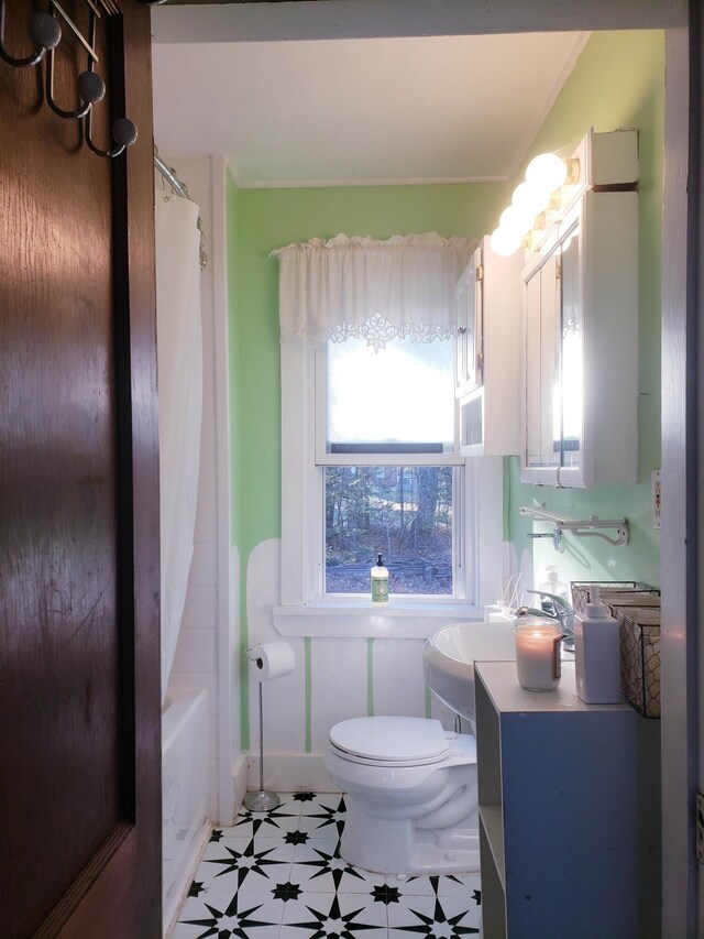 599 Plains Rd, Hollis, ME 04042 - full bathroom featuring toilet, vanity, shower / bath combination with curtain, and tile patterned floors