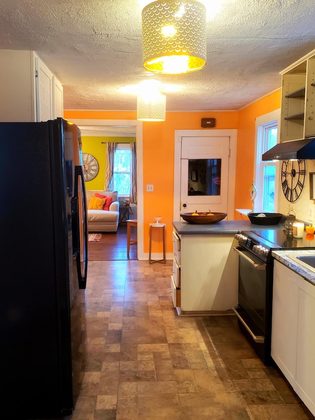 599 Plains Rd, Hollis, ME 04042 - kitchen with freestanding refrigerator, extractor fan, a textured ceiling, electric range, and white cabinetry