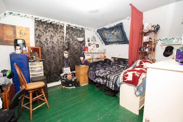 bedroom featuring dark hardwood / wood-style floors and vaulted ceiling