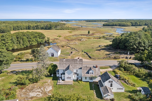 bird's eye view featuring a rural view and a water view