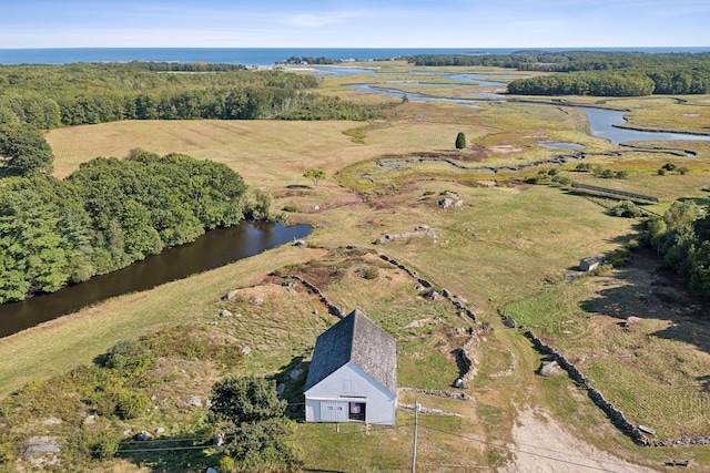 bird's eye view featuring a rural view and a water view