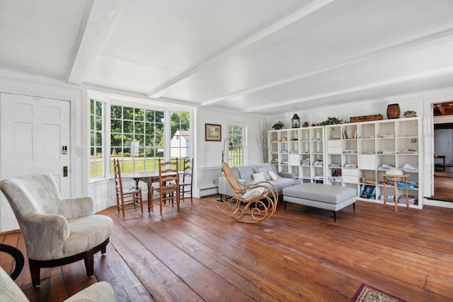 interior space with hardwood / wood-style floors and beam ceiling