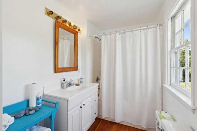 bathroom featuring vanity and hardwood / wood-style flooring