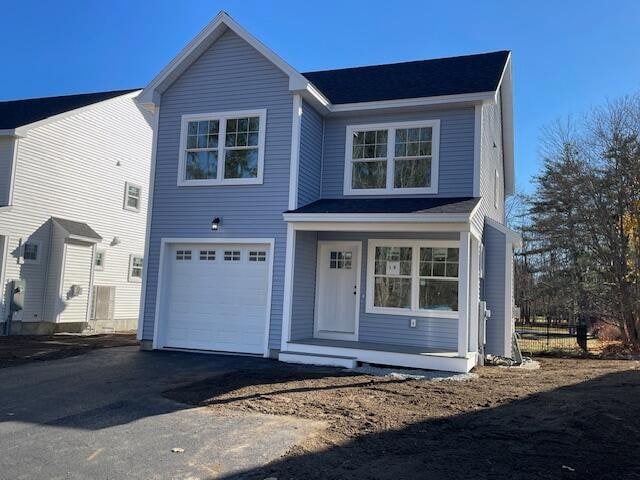 view of front property featuring a garage