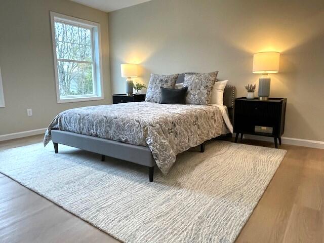 bedroom featuring hardwood / wood-style floors