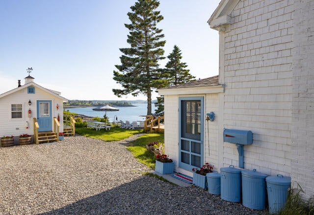 exterior space with a water view and entry steps